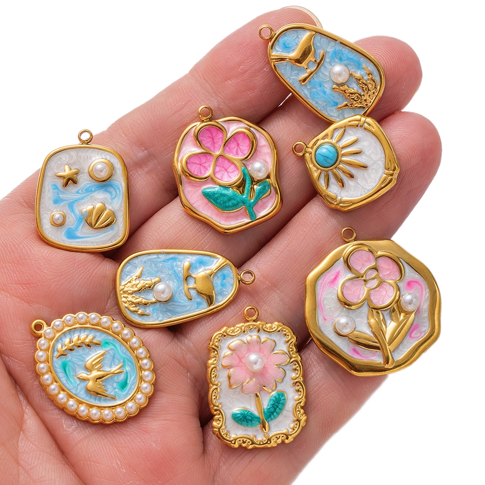 2 pendenti con ciondoli a form - Embellishment Crafts recensione e prezzo