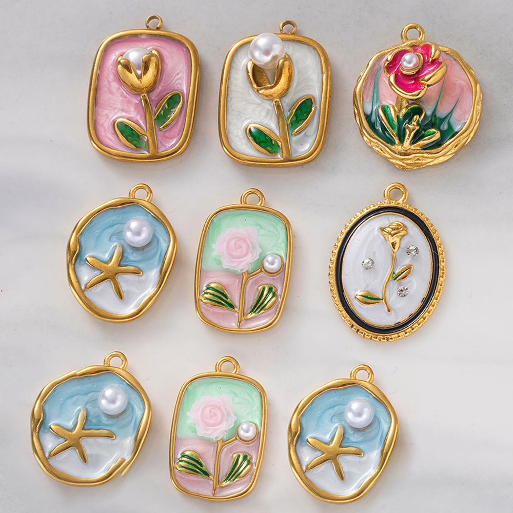 2 pendenti con ciondoli a form - Embellishment Crafts recensione e prezzo